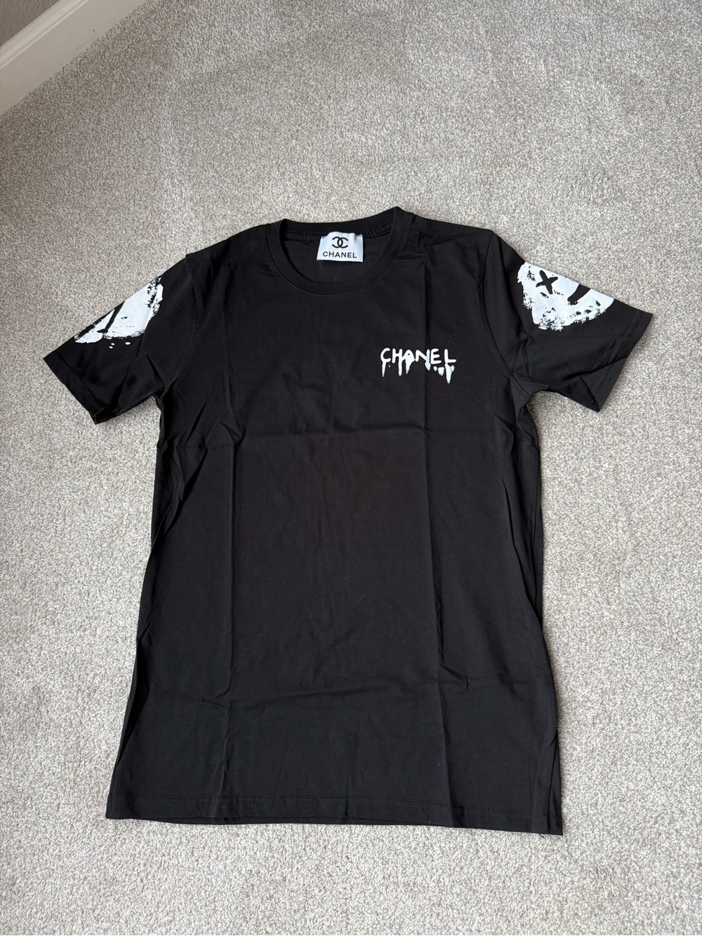 Black Short-Sleeve Tee with White Graphic Accents M/L